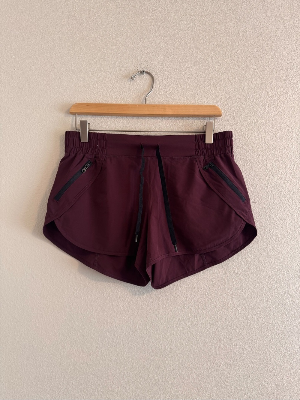 ZYIA Women's Deep Plum Athletic Shorts with Zip Pockets